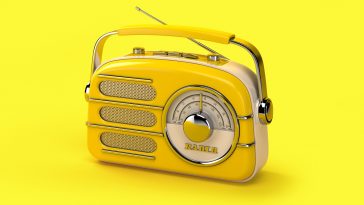 broadcastnews yellow vintage radio on yellow background 01